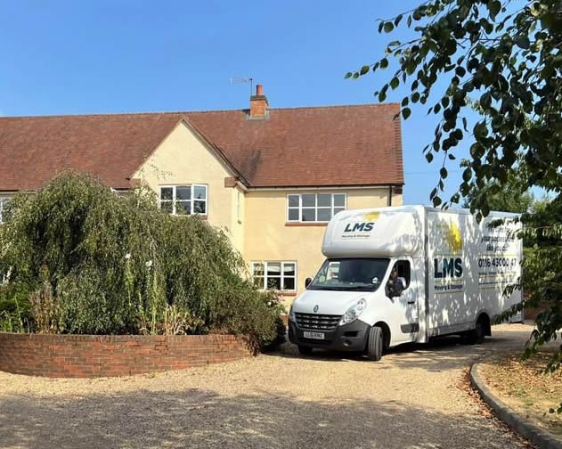 removal van outside large home