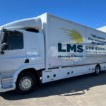 Leicester Movers and Storers van parked in the depot on a sunny day