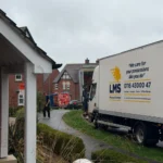WA0005_streetview_staff_with_sideprofile_branded_lorry_inline